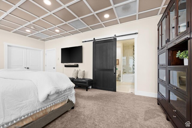 875 S Donner Way E Unit 111, Salt Lake City, UT 84108 - bedroom featuring a barn door, recessed lighting, light colored carpet, and baseboards