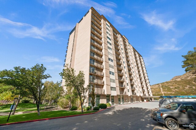 875 S Donner Way E Unit 111, Salt Lake City, UT 84108 - view of property featuring a mountain view