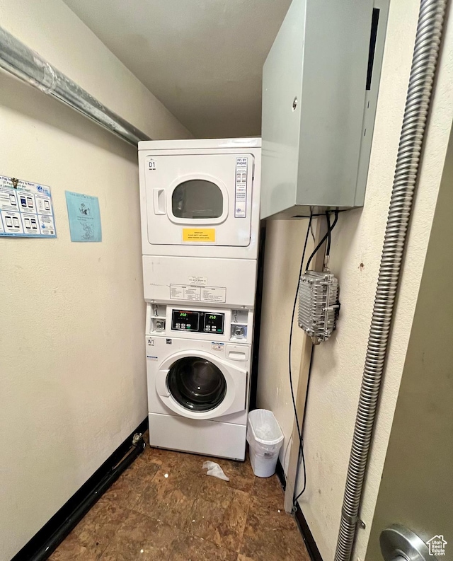 1940 Prospector Ave Unit 307, Park City, UT 84060 - laundry room featuring stacked washer / drying machine and baseboards