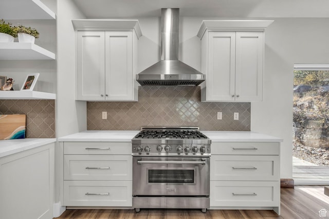 7759 Susans Cir, Park City, UT 84098 - kitchen with high end range, wall chimney exhaust hood, white cabinetry, light countertops, and open shelves