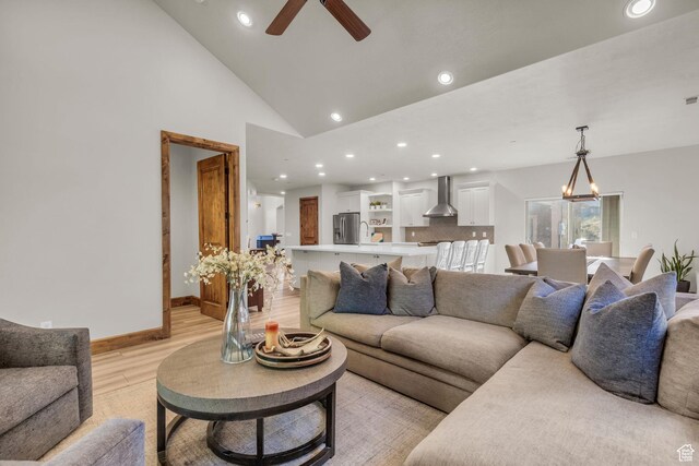 7759 Susans Cir, Park City, UT 84098 - living area with recessed lighting, light wood-style flooring, a ceiling fan, baseboards, and a chandelier