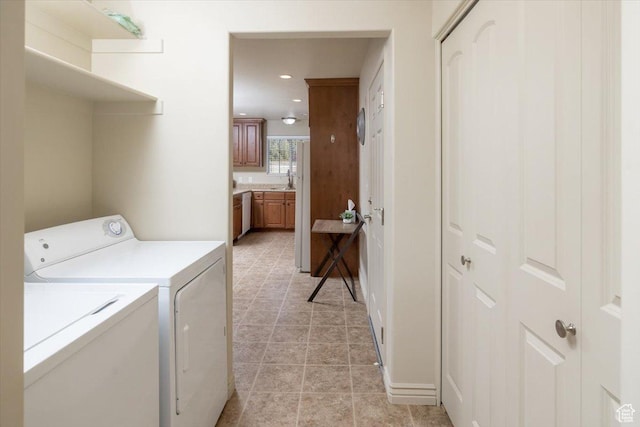385 E 2280 N Unit D, North Logan, UT 84341 - washroom featuring washing machine and clothes dryer and recessed lighting