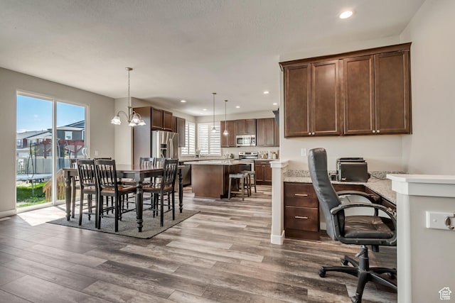 office area featuring wood finished floors and recessed lighting