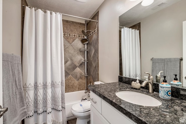 bathroom featuring toilet, shower / bath combo with shower curtain, vanity, and visible vents
