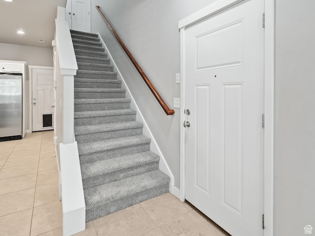 1138 N Shepard Creek Pkwy W Unit 2, Farmington, UT 84025 - stairs featuring tile patterned floors, baseboards, and recessed lighting