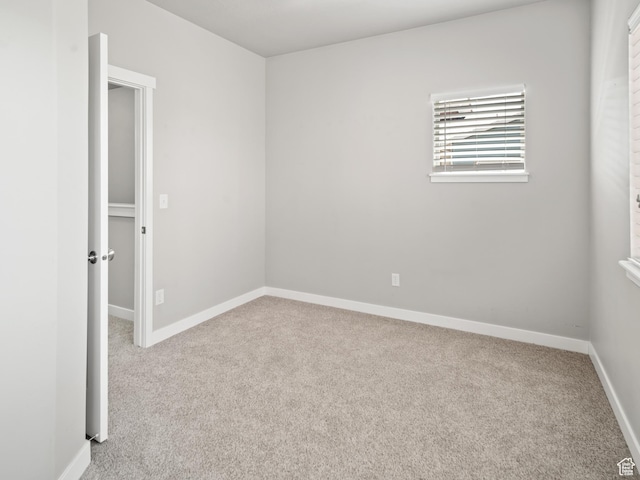 1138 N Shepard Creek Pkwy W Unit 2, Farmington, UT 84025 - carpeted spare room with baseboards