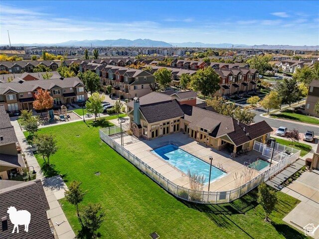 1138 N Shepard Creek Pkwy W Unit 2, Farmington, UT 84025 - aerial perspective of suburban area featuring a pool and mountains