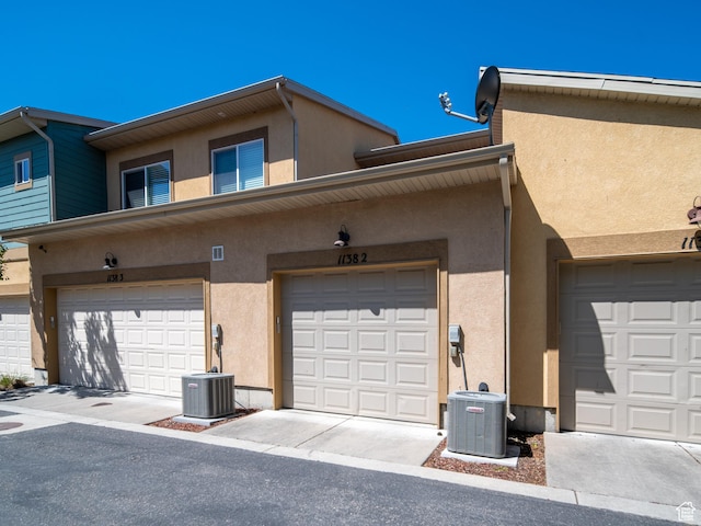 1138 N Shepard Creek Pkwy W Unit 2, Farmington, UT 84025 - garage featuring central air condition unit