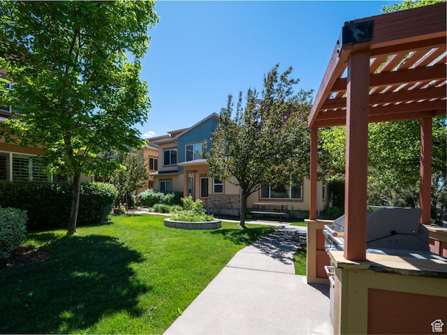 1138 N Shepard Creek Pkwy W Unit 2, Farmington, UT 84025 - view of grassy yard with a pergola