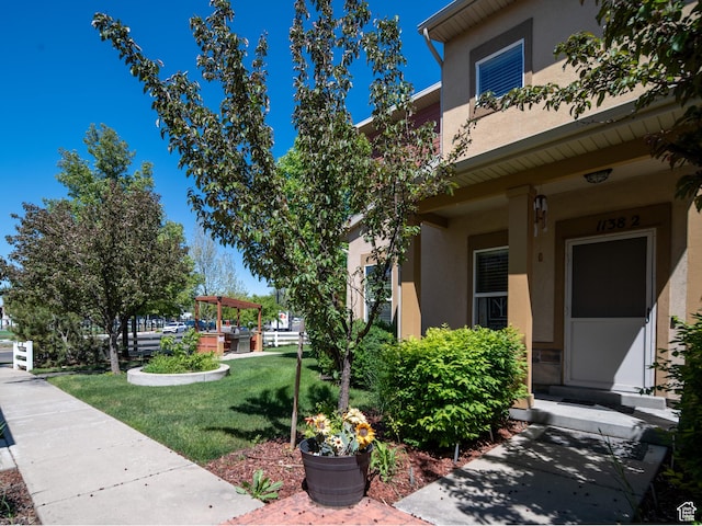 1138 N Shepard Creek Pkwy W Unit 2, Farmington, UT 84025 - view of side of home with stucco siding and a yard