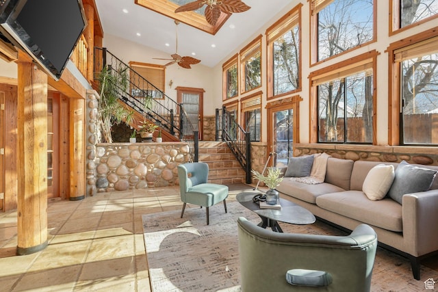 3640 E Aurora Cir, Salt Lake City, UT 84124 - living room with recessed lighting, ceiling fan, a high ceiling, and stairs