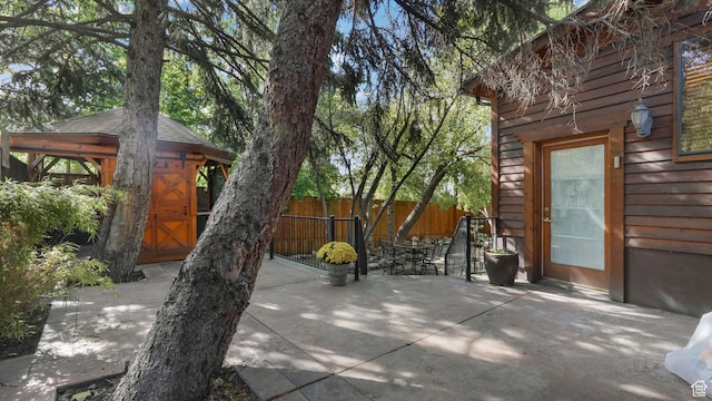3640 E Aurora Cir, Salt Lake City, UT 84124 - view of patio with fence and a gazebo