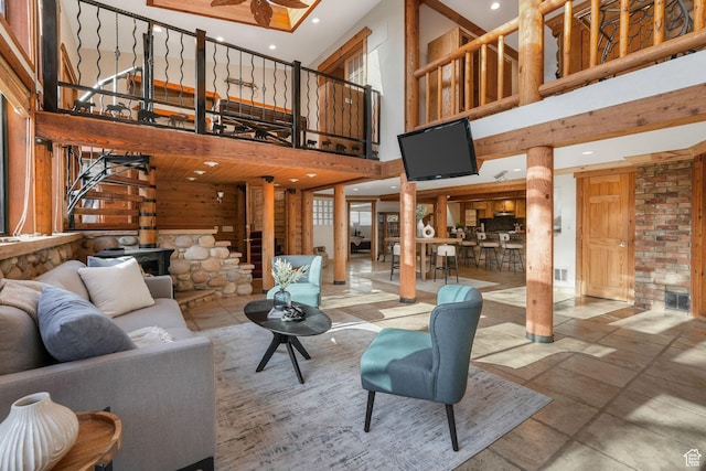 3640 E Aurora Cir, Salt Lake City, UT 84124 - living area featuring visible vents, a towering ceiling, decorative columns, and recessed lighting