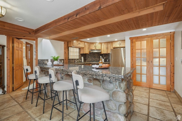 3640 E Aurora Cir, Salt Lake City, UT 84124 - kitchen featuring tasteful backsplash, freestanding refrigerator, stone tile flooring, french doors, and beam ceiling