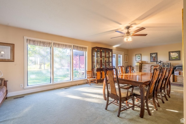452 S 100 W, Salina, UT 84654 - dining room with ceiling fan, light colored carpet, and a wealth of natural light