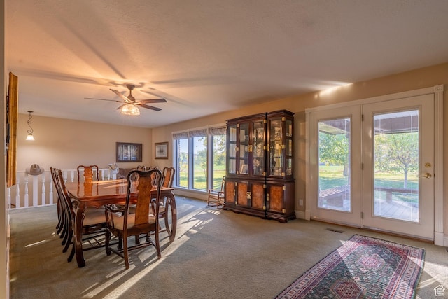 452 S 100 W, Salina, UT 84654 - dining room featuring carpet flooring, ceiling fan, and visible vents
