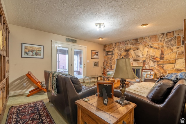 452 S 100 W, Salina, UT 84654 - living room with carpet floors, a textured ceiling, baseboards, and french doors