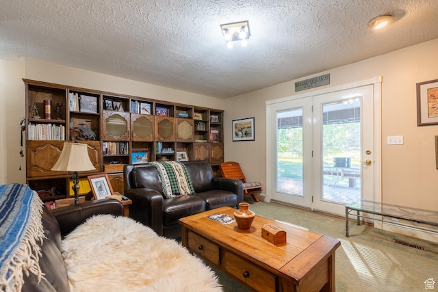 452 S 100 W, Salina, UT 84654 - living area featuring carpet flooring, a textured ceiling, and visible vents