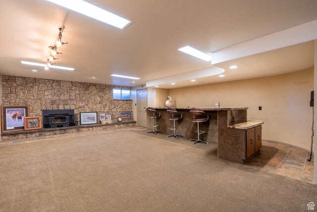 452 S 100 W, Salina, UT 84654 - bar with track lighting, a wood stove, recessed lighting, bar, and carpet flooring