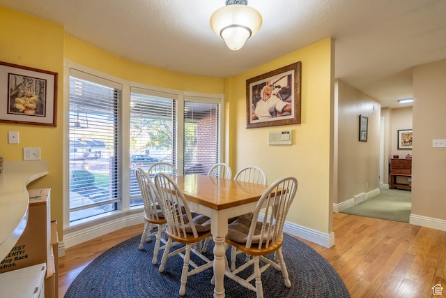 452 S 100 W, Salina, UT 84654 - dining area with light wood-style floors and baseboards