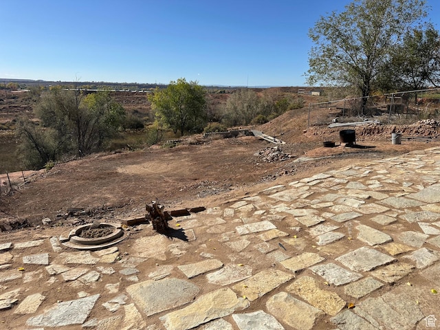 exterior space featuring an outdoor fire pit