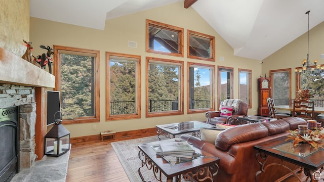 4170 Moosehollow Rd, Park City, UT 84098 - living room with hardwood / wood-style floors, high vaulted ceiling, a fireplace, and beam ceiling