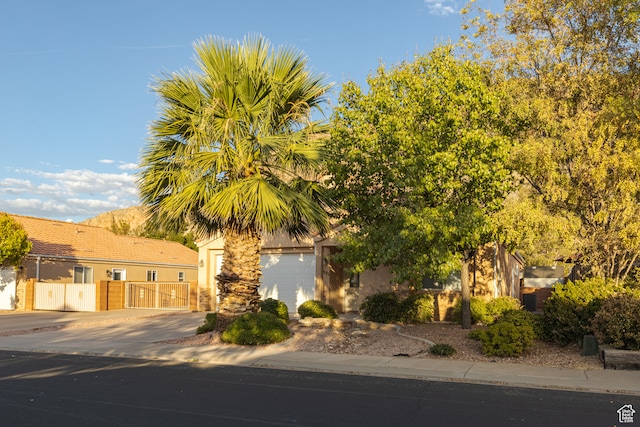 2331 S 675 W, Hurricane, UT 84737 - obstructed view of property featuring a garage