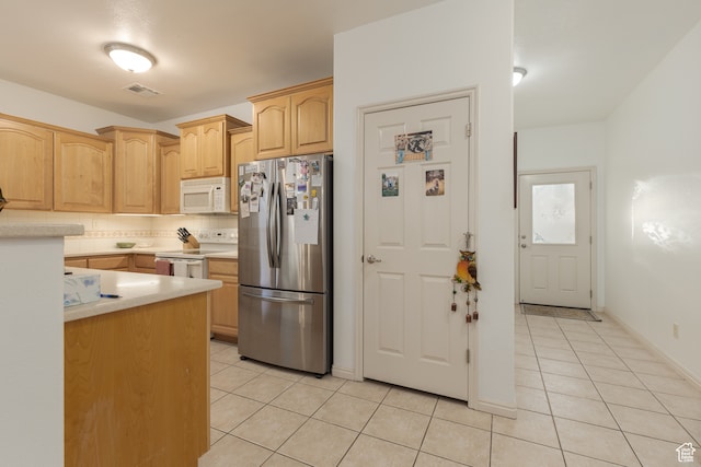 2331 S 675 W, Hurricane, UT 84737 - kitchen with white appliances, light brown cabinetry, and light tile patterned floors