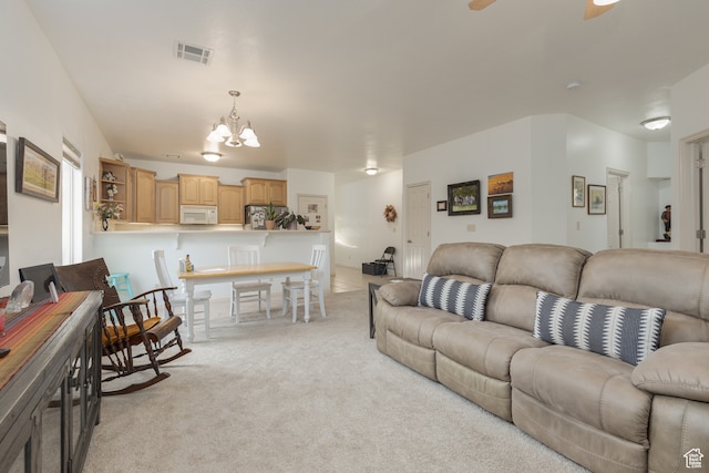 2331 S 675 W, Hurricane, UT 84737 - living room with a notable chandelier and light colored carpet