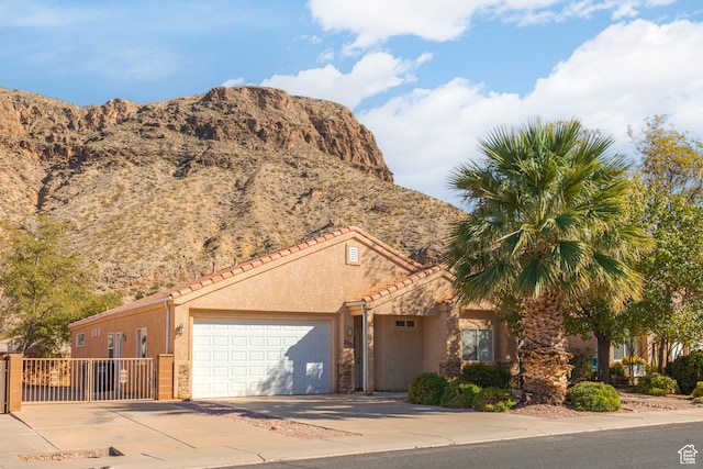 2331 S 675 W, Hurricane, UT 84737 - view of front of home with a mountain view and a garage