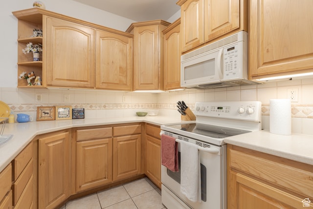 2331 S 675 W, Hurricane, UT 84737 - kitchen featuring decorative backsplash, light tile patterned floors, and white appliances