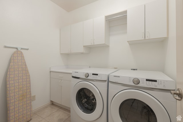 2331 S 675 W, Hurricane, UT 84737 - laundry room with cabinets, washer and clothes dryer, and light tile patterned floors