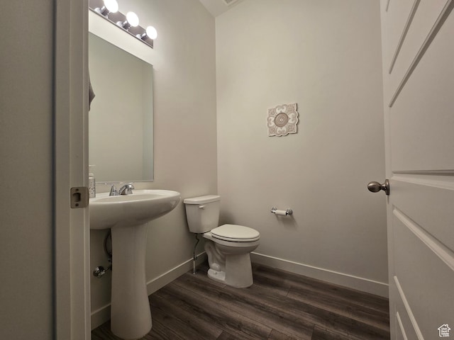 697 N 3275 W, Layton, UT 84041 - half bathroom featuring baseboards and wood finished floors