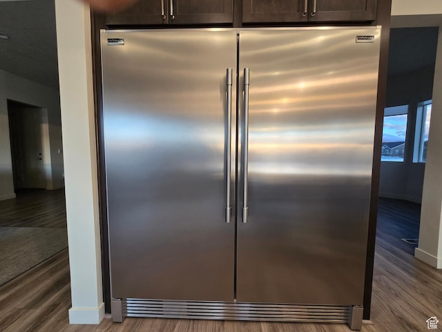 697 N 3275 W, Layton, UT 84041 - kitchen view of stainless steel built in refrigerator, wood finished floors, and dark brown cabinets