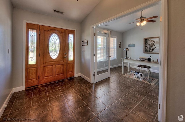 2304 Spanish Valley Dr, Moab, UT 84532 - entryway with vaulted ceiling, baseboards, a ceiling fan, and dark tile patterned flooring