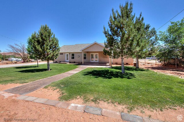 2304 Spanish Valley Dr, Moab, UT 84532 - view of front of house featuring french doors and stucco siding
