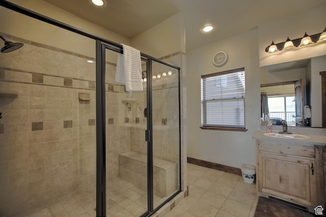 21 Gentle Ben Cir, Fish Haven, ID 83287 - bathroom featuring vanity, a shower with shower door, and tile patterned floors
