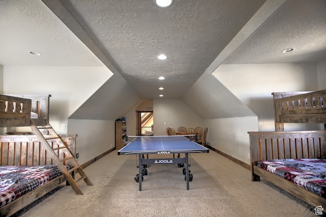 21 Gentle Ben Cir, Fish Haven, ID 83287 - playroom with lofted ceiling, a textured ceiling, and carpet floors