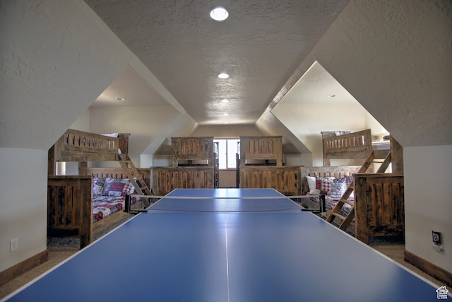 21 Gentle Ben Cir, Fish Haven, ID 83287 - rec room with vaulted ceiling and a textured ceiling