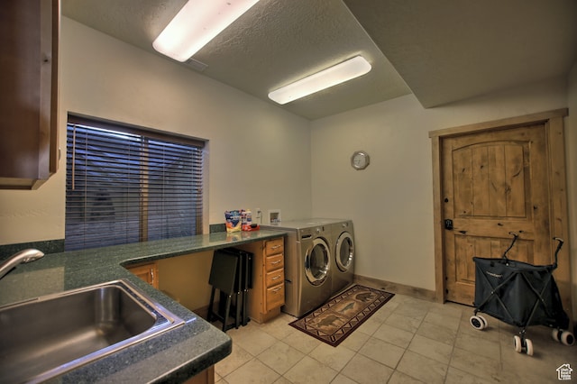 21 Gentle Ben Cir, Fish Haven, ID 83287 - washroom featuring washer and dryer, sink, light tile patterned floors, and a textured ceiling