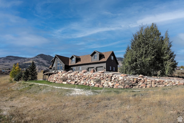 21 Gentle Ben Cir, Fish Haven, ID 83287 - rear view of house featuring a mountain view