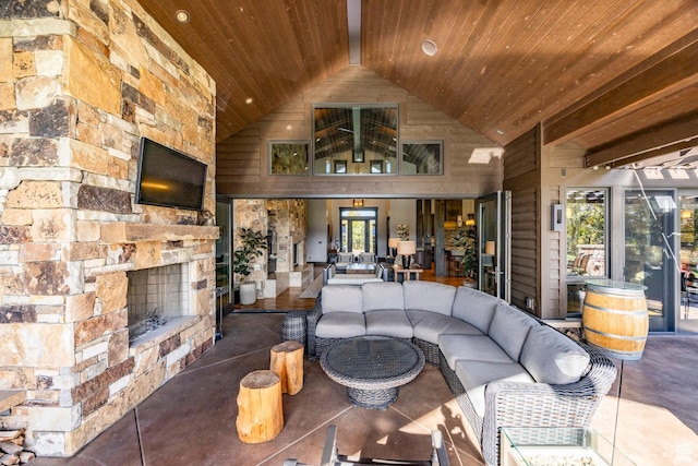 1159 Snow Berry St, Park City, UT 84098 - living area with a wealth of natural light, wooden ceiling, an outdoor stone fireplace, and high vaulted ceiling