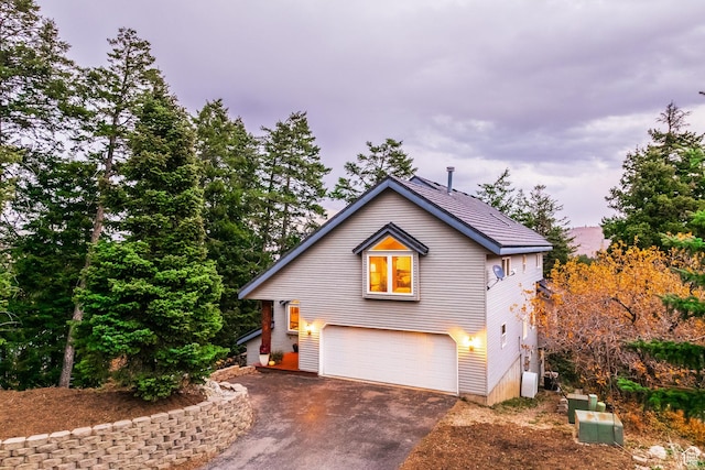 105 Paradise Rd, Summit Park, UT 84098 - view of front of home with driveway and an attached garage
