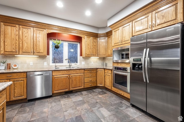 105 Paradise Rd, Summit Park, UT 84098 - kitchen featuring appliances with stainless steel finishes, a sink, backsplash, light stone countertops, and recessed lighting