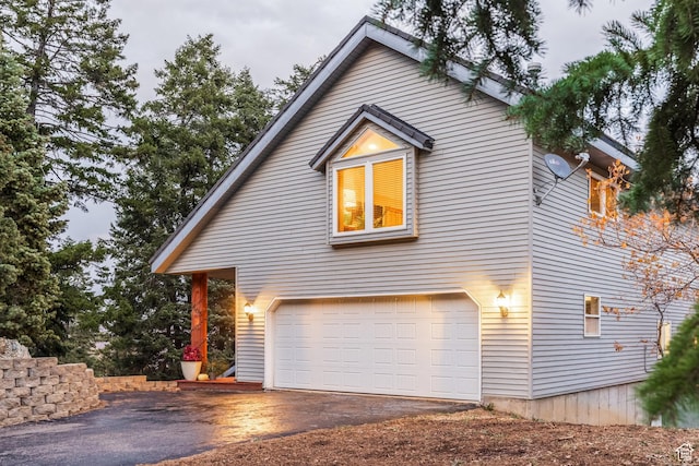 105 Paradise Rd, Summit Park, UT 84098 - view of side of property featuring asphalt driveway and an attached garage