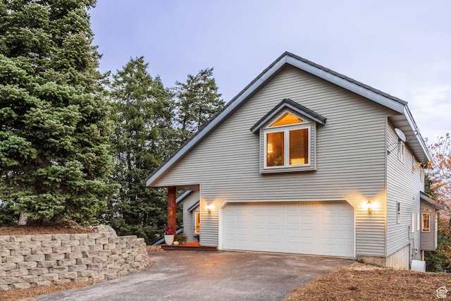 105 Paradise Rd, Summit Park, UT 84098 - view of front of house with asphalt driveway and a garage
