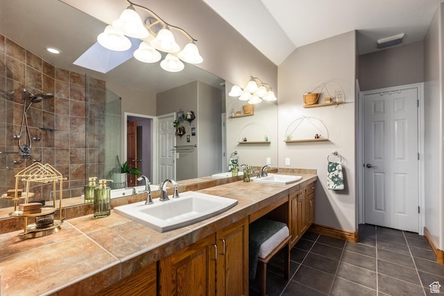 105 Paradise Rd, Summit Park, UT 84098 - full bathroom with tile patterned flooring, double vanity, a tile shower, baseboards, and a chandelier