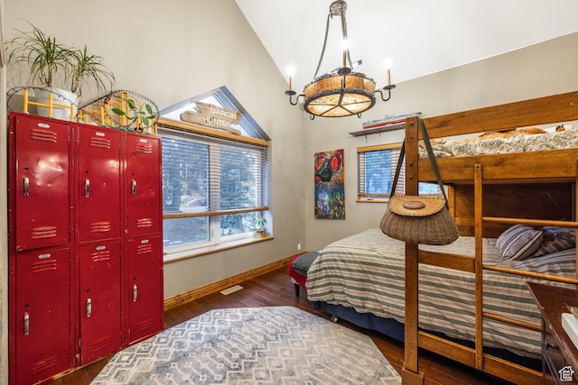 105 Paradise Rd, Summit Park, UT 84098 - bedroom featuring wood finished floors, vaulted ceiling, baseboards, and a chandelier