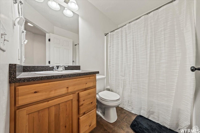 1758 W 5025 S, Roy, UT 84067 - bathroom featuring toilet, vanity, and tile patterned floors