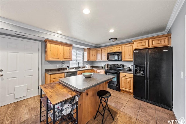 1758 W 5025 S, Roy, UT 84067 - kitchen featuring dark countertops, crown molding, a sink, and black appliances